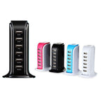 Five USB charging stations in black, pink, blue, and white on a white background