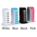 Four USB chargers in white, blue, black, and pink on a white background.