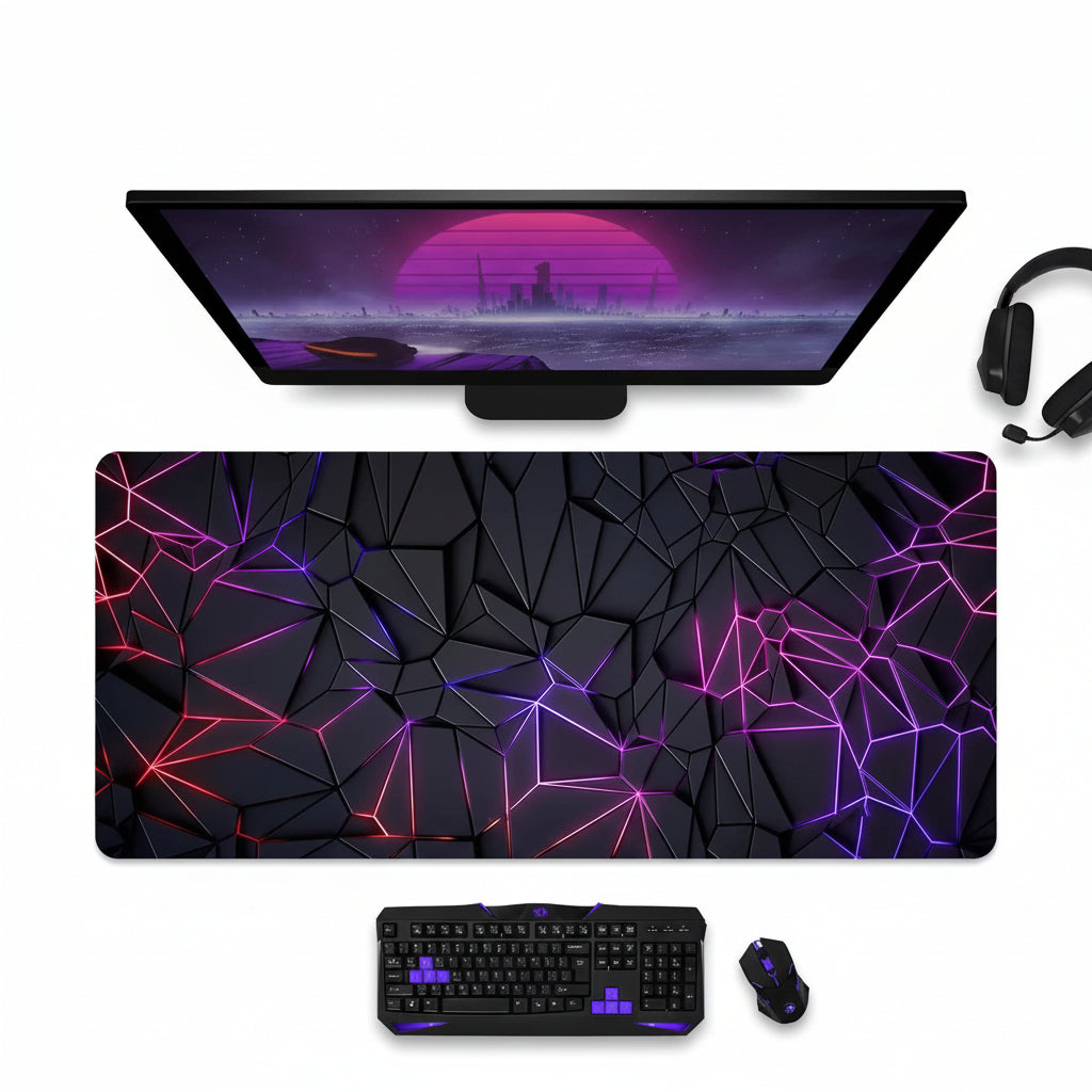 Gaming setup with a large mouse pad featuring geometric design, keyboard, and mouse on a dark surface.